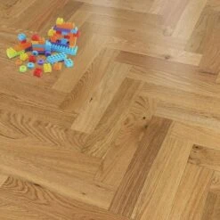 Liberty Floors Natural Oak - Herringbone Parquet 14mm Engineered Real Wood Flooring (219384) -Premium Floor Shop natural oak herringbone parquet 14mm engineered real wood flooring 219384 p85832 201387 image